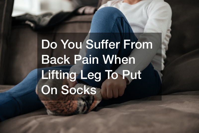 back pain when lifting leg to put on socks